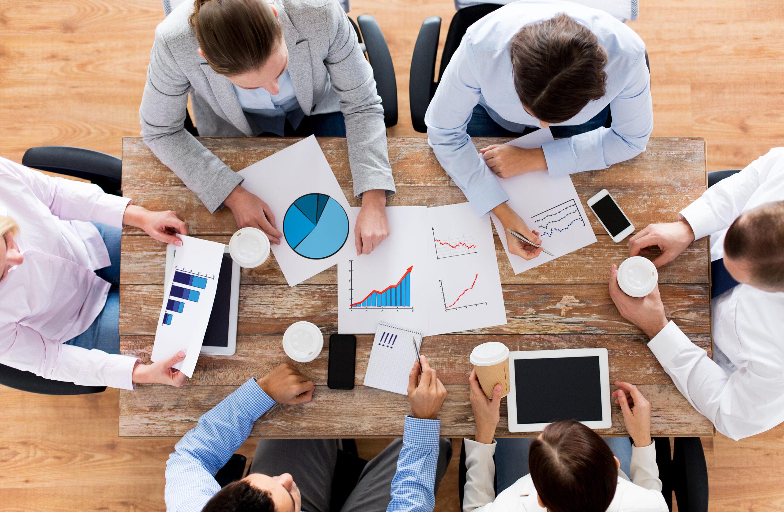 Las Vegas Mastermind Group Meets Monthly to Discuss their Issues at a Conference Table